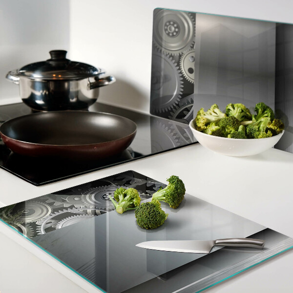 Schneidebrett mit Motiv aus mechanischen Zahnrädern und metallischer Oberfläche