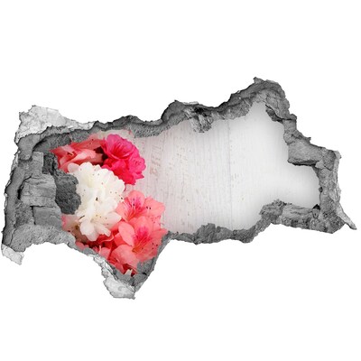 Wandtattoos Mauerdurchbruch Eine blühende Oase hinter der Mauer