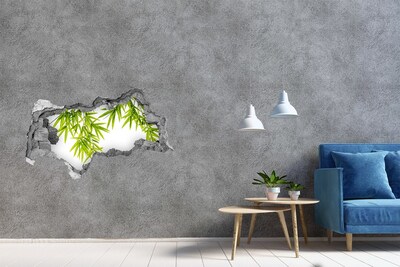 Mauerdurchbruch Aufkleber Grüner Bambus wächst durch ein Loch in der Wand