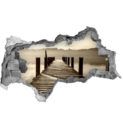 Mauerdurchbruch Aufkleber Pier über ruhigem Wasser