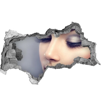 Wandtattoos Mauerdurchbruch Ein sinnliches Gesicht in einer zerbrochenen Wand