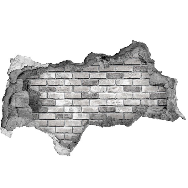 Wandtattoos Mauerdurchbruch Eine zerstörte Backsteinmauer