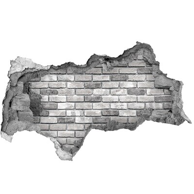Wandtattoos Mauerdurchbruch Eine zerstörte Backsteinmauer