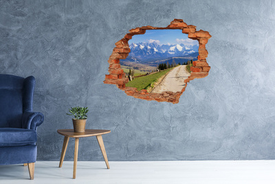 Wandtattoos Loch in der Wand Berglandschaft hinter dem Loch in der Wand