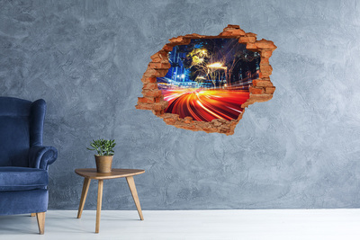 Wandtattoos Loch in der Wand Eine Stadt in Bewegung bei Nacht