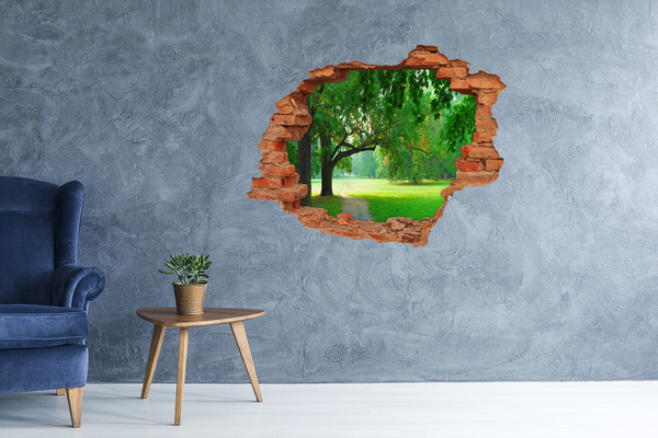 Wandtattoos Loch in der Wand Grüner Park in der Sonne