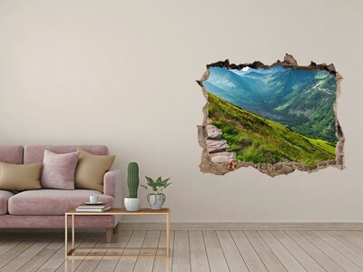Wandfolien Loch in der Wand Berglandschaft hinter dem Loch in der Wand