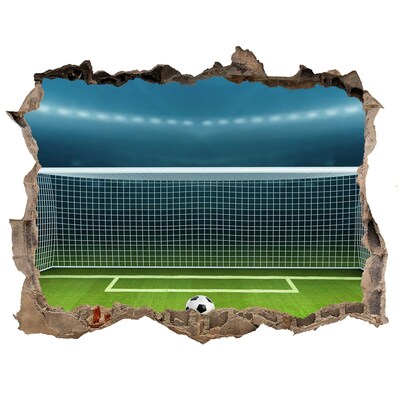 Wandtattoos Loch Das Fußballstadion hinter dem Loch in der Mauer