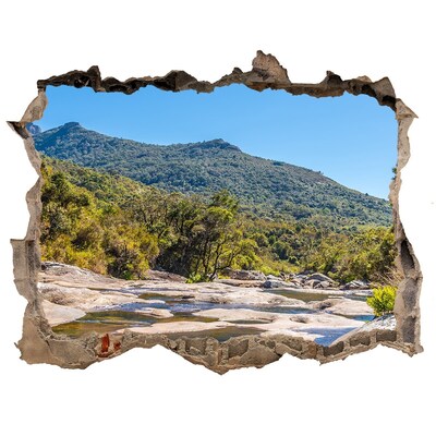 Wandfolien Loch in der Wand Berglandschaft hinter dem Loch in der Wand