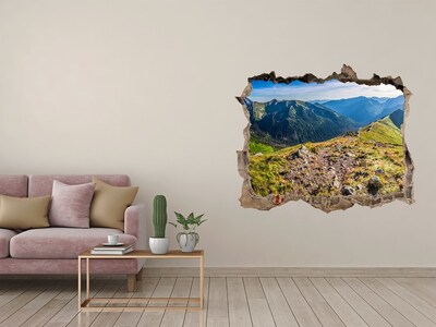 Wandtattoos Loch Berglandschaft durch ein Loch in der Wand