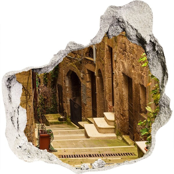 Wandfolien Loch in der Wand Eine charmante Straße in der Stadt