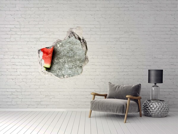 Wandfolien Loch in der Wand Eine Scheibe Wassermelone in Beton