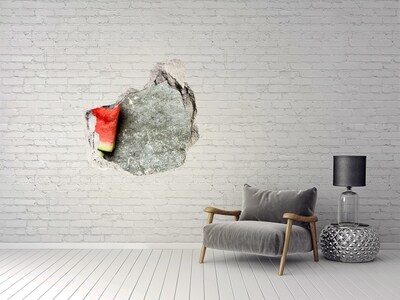 Wandfolien Loch in der Wand Eine Scheibe Wassermelone in Beton