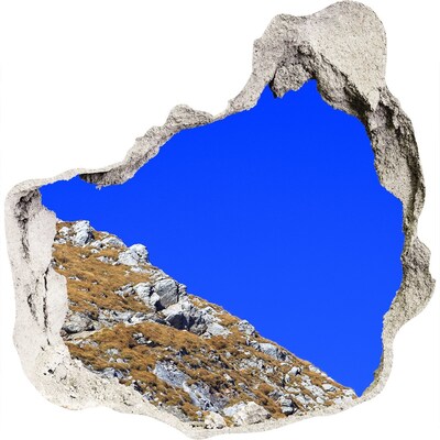 Wandaufkleber Loch 3D Berglandschaft durch ein Loch in der Wand