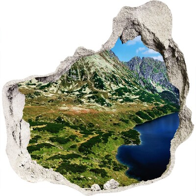 Wandaufkleber Loch 3D Berglandschaft mit einem See
