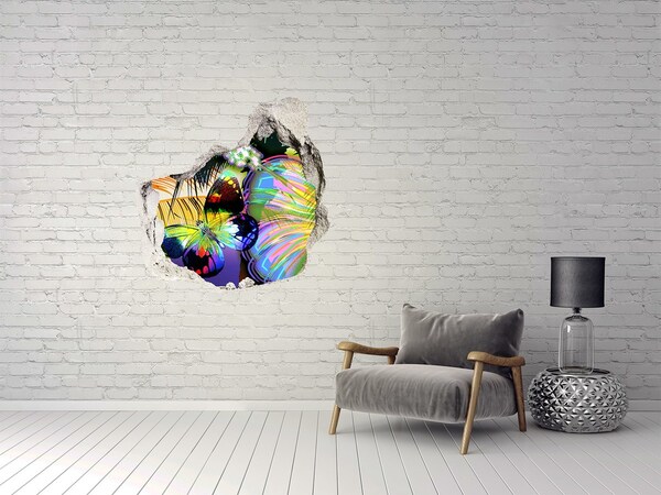 Wandaufkleber Loch 3D Ein bunter Schmetterling in einem Loch in der Wand