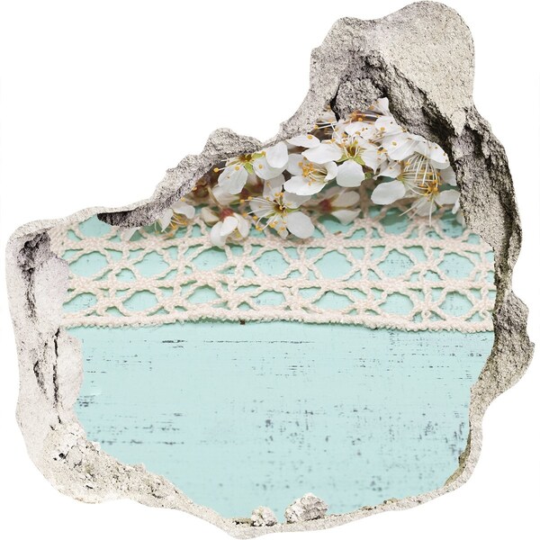 Wandfolien Loch in der Wand Blumenmotiv auf blauem Holzgrund