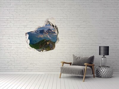 Wandaufkleber Loch 3D Berglandschaft hinter dem Loch in der Wand