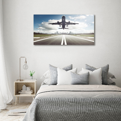Foto auf Acryl Ein Flugzeug startet