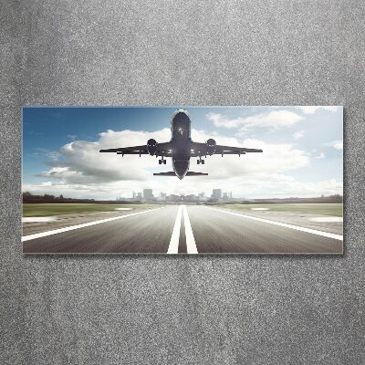 Foto auf Acryl Ein Flugzeug startet