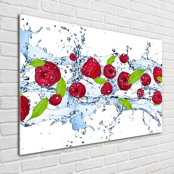 Bild auf Acrylglas Himbeeren und Wasser