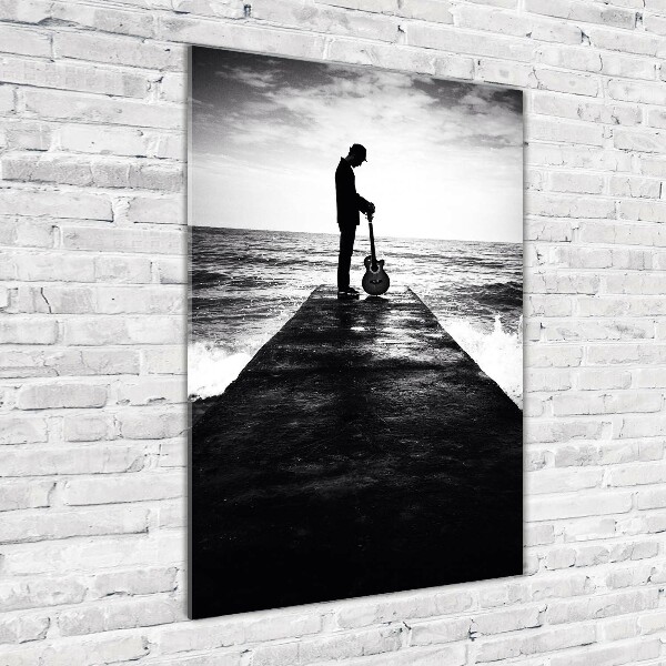 Plexiglasbilder vertikal Gitarrist auf dem Pier