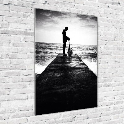 Plexiglasbilder vertikal Gitarrist auf dem Pier