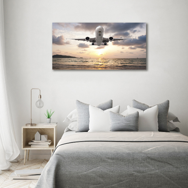 Fotobild Ein Flugzeug über dem Meer