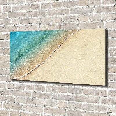 Wandbild Eine Welle am Strand