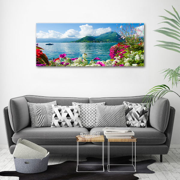 Bild auf leinwand Blumen am See
