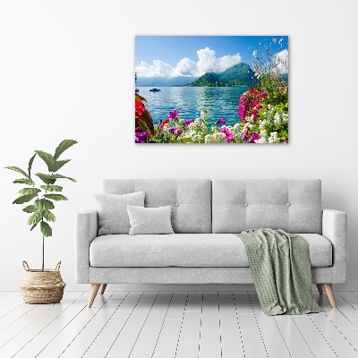 Bild auf leinwand Blumen am See