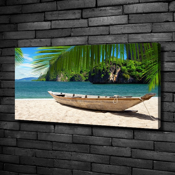 Bild auf leinwand Ein Boot am Strand