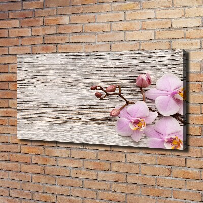 Bild auf leinwand Orchidee auf Holz