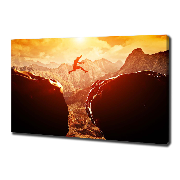 Wandbild Spring über den Abgrund