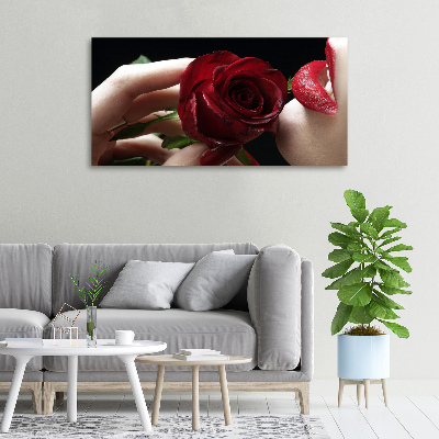 Wandbild Frau mit einer Rose