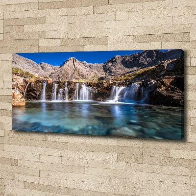 Bild auf leinwand Wasserfall in den Bergen