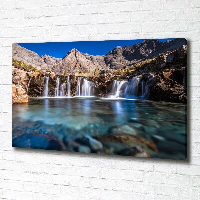 Bild auf leinwand Wasserfall in den Bergen