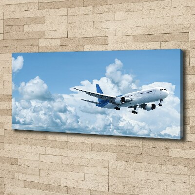 Wandbild Ein Flugzeug am Himmel