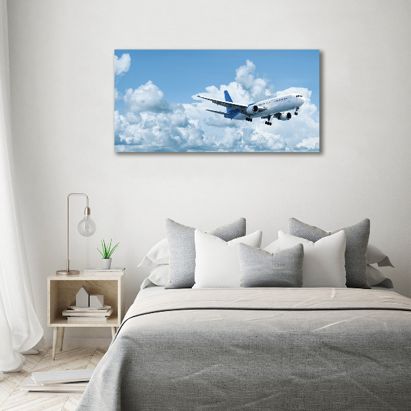 Wandbild Ein Flugzeug am Himmel