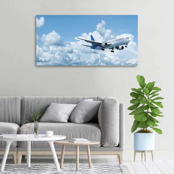 Wandbild Ein Flugzeug am Himmel