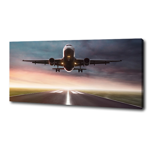 Wandbild Ein Flugzeug startet