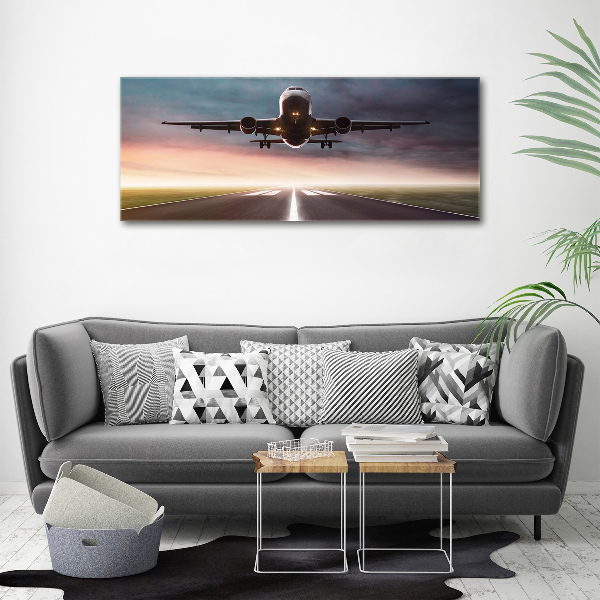 Wandbild Ein Flugzeug startet