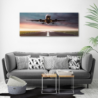 Wandbild Ein Flugzeug startet
