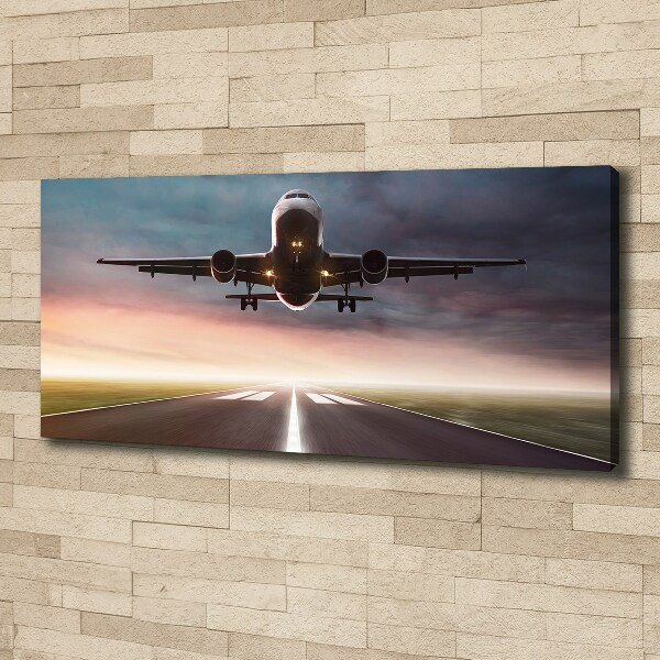 Wandbild Ein Flugzeug startet