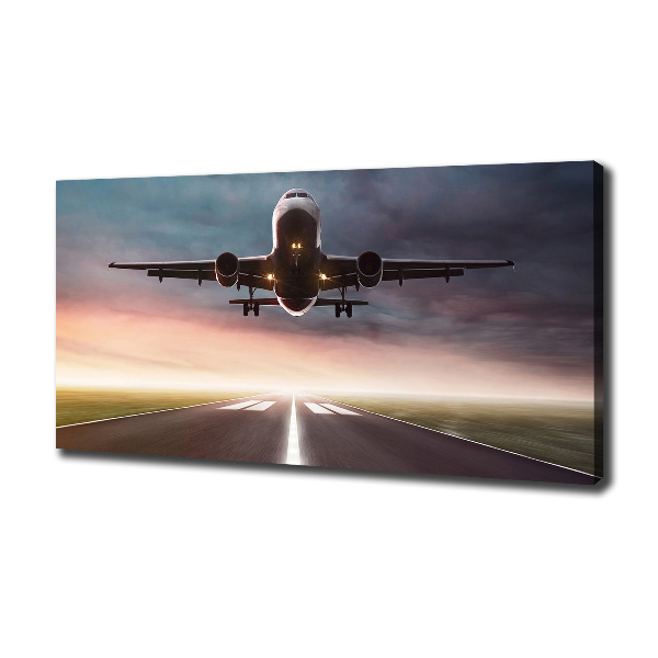 Wandbild Ein Flugzeug startet