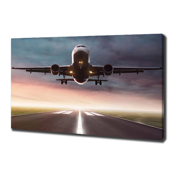 Wandbild Ein Flugzeug startet