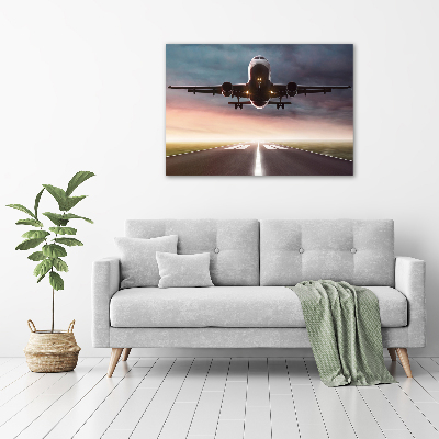 Wandbild Ein Flugzeug startet