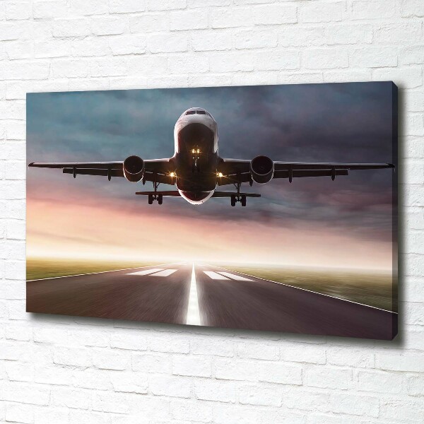 Wandbild Ein Flugzeug startet