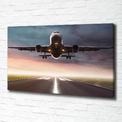 Wandbild Ein Flugzeug startet
