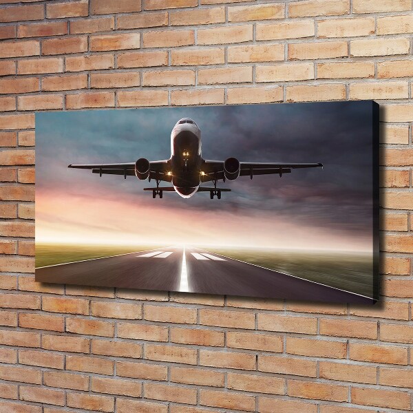 Wandbild Ein Flugzeug startet